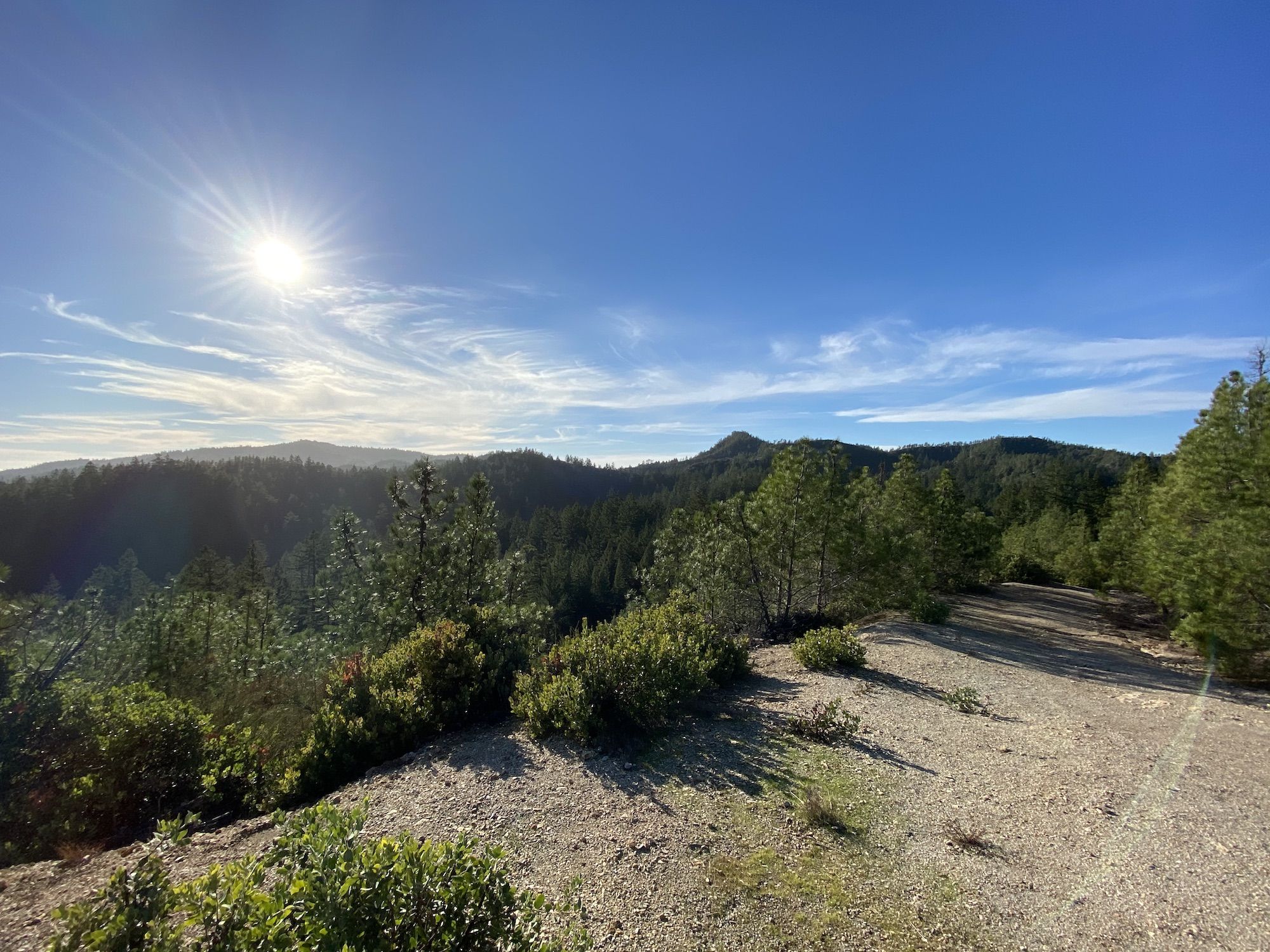 Clear blue skies over rolling green hills