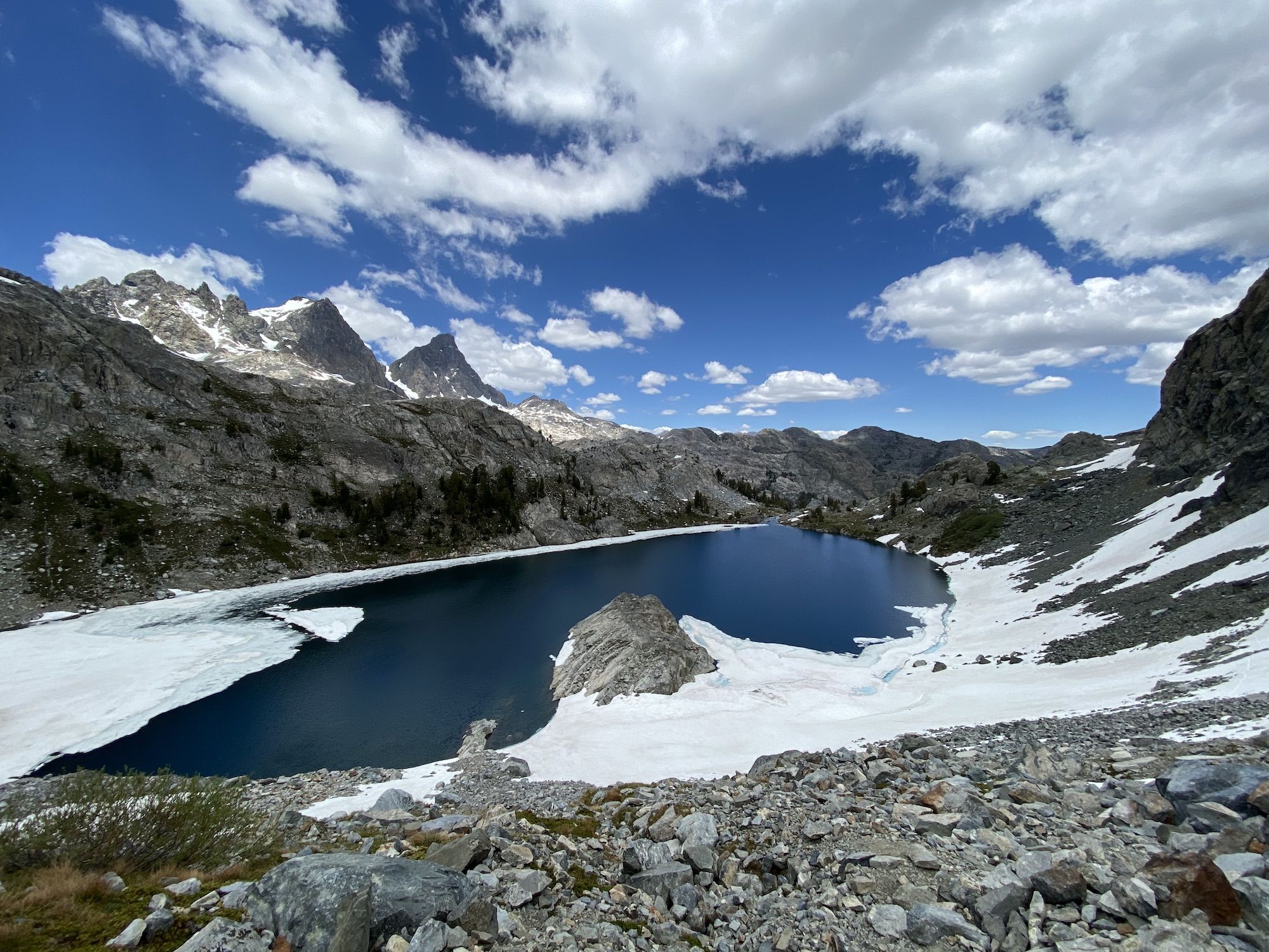 A lake with floating ice