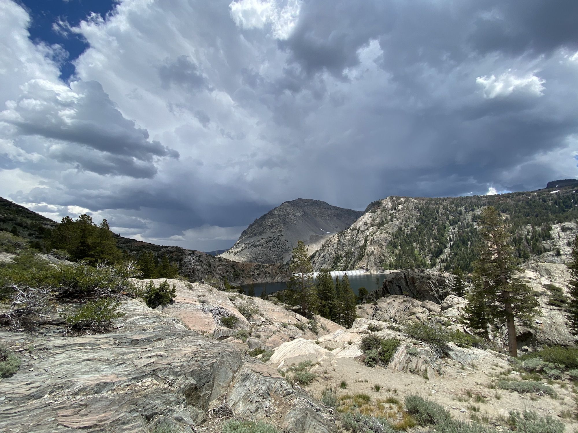 Thunder clouds behind mountains