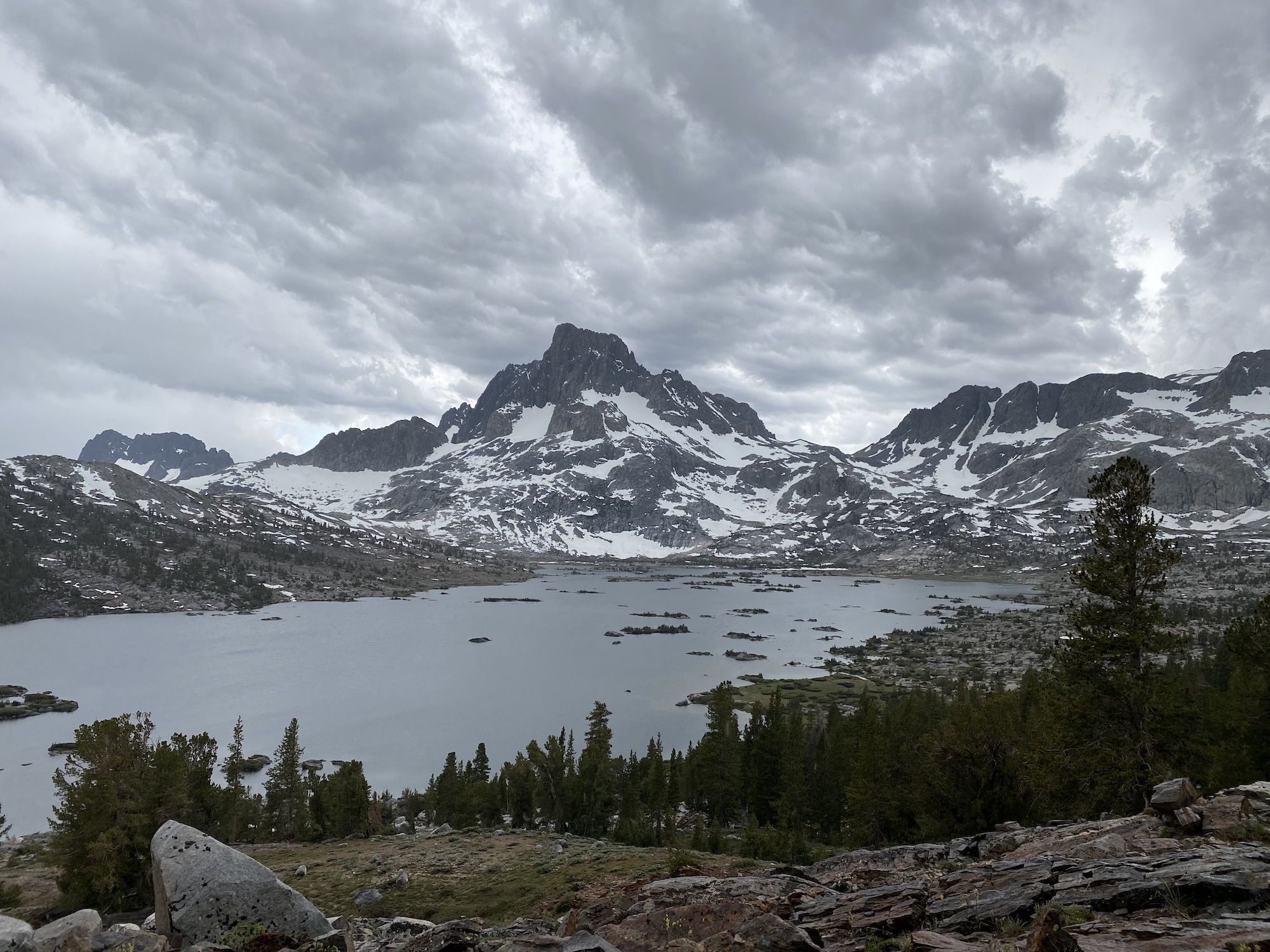 Dark storm clouds over a lake