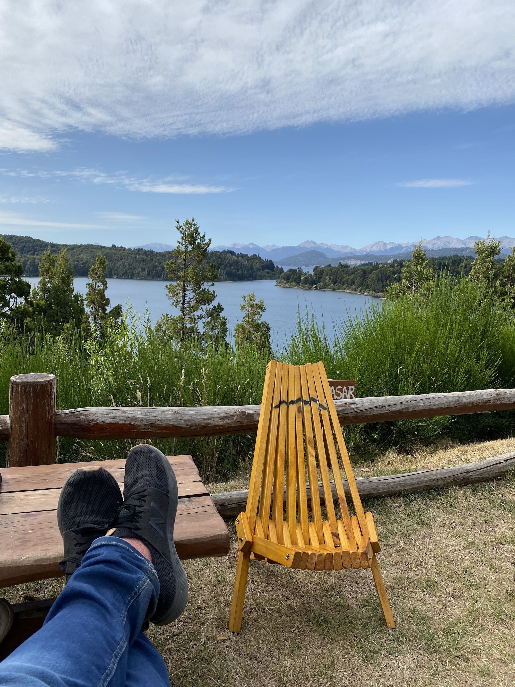 Feet up on table. Views of lakes and mountains.