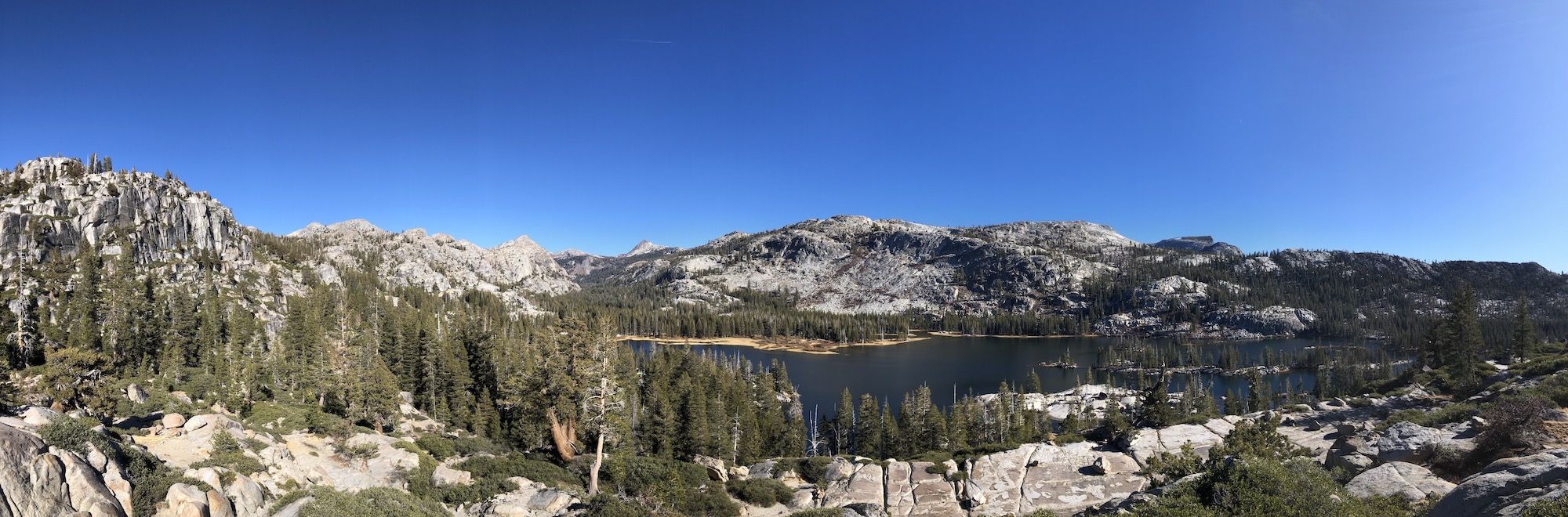 Granite mountains surrounding a lake