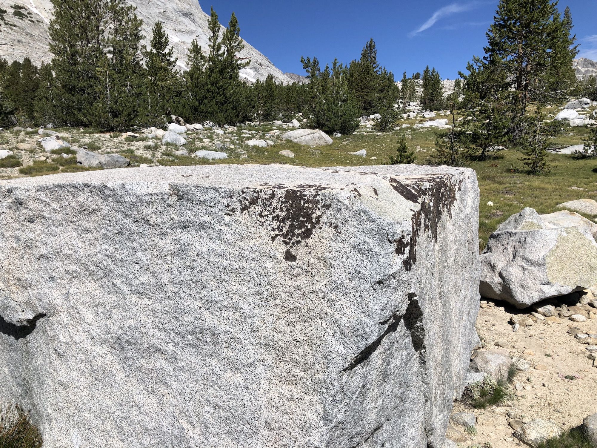 A square granite boulder.