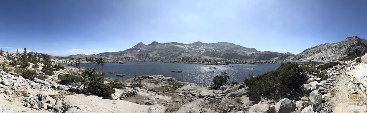 Panoramic views of the granite wall behind Lake Aloha.