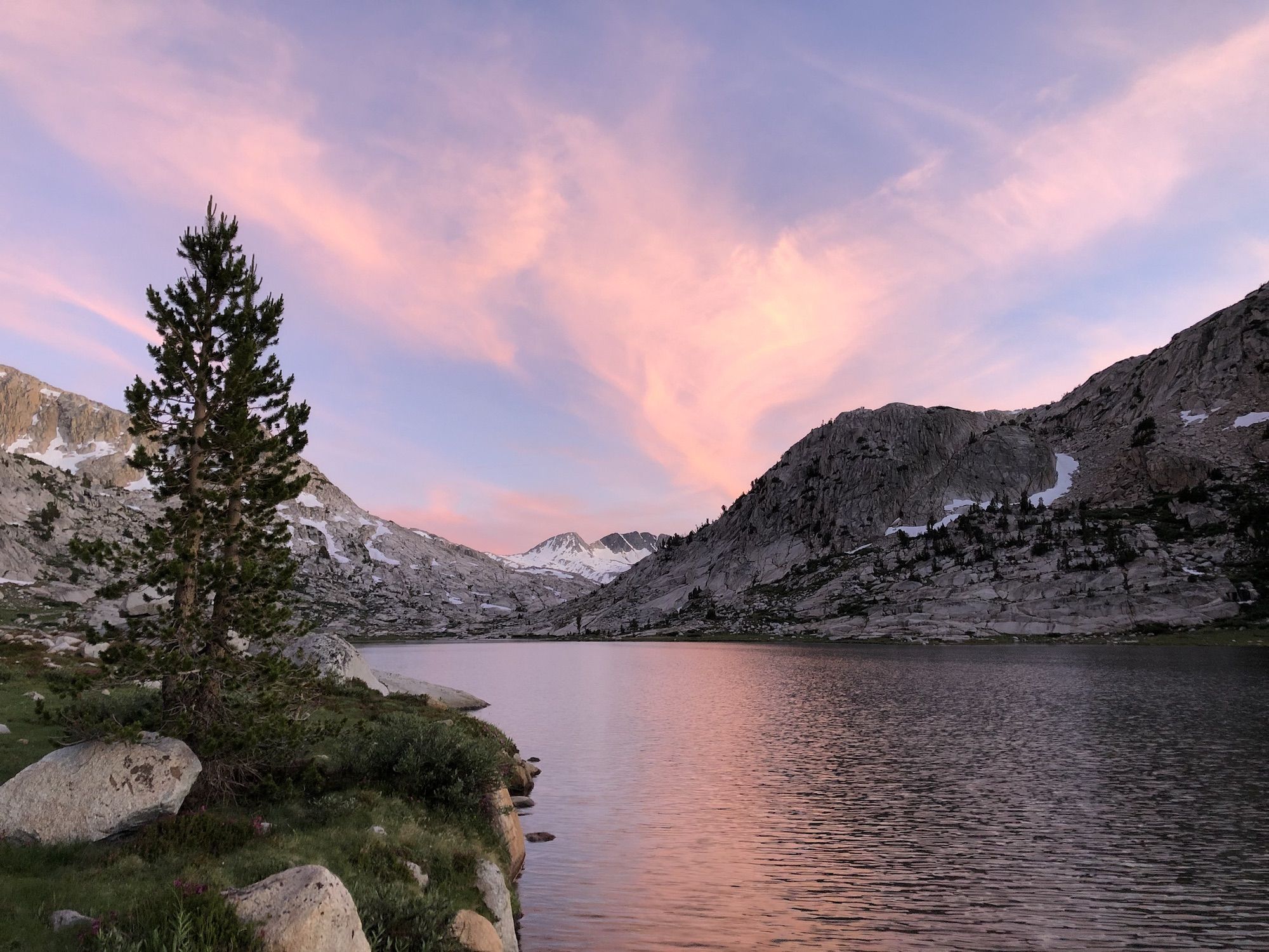 Pink clouds reflecting off the lake surface. 