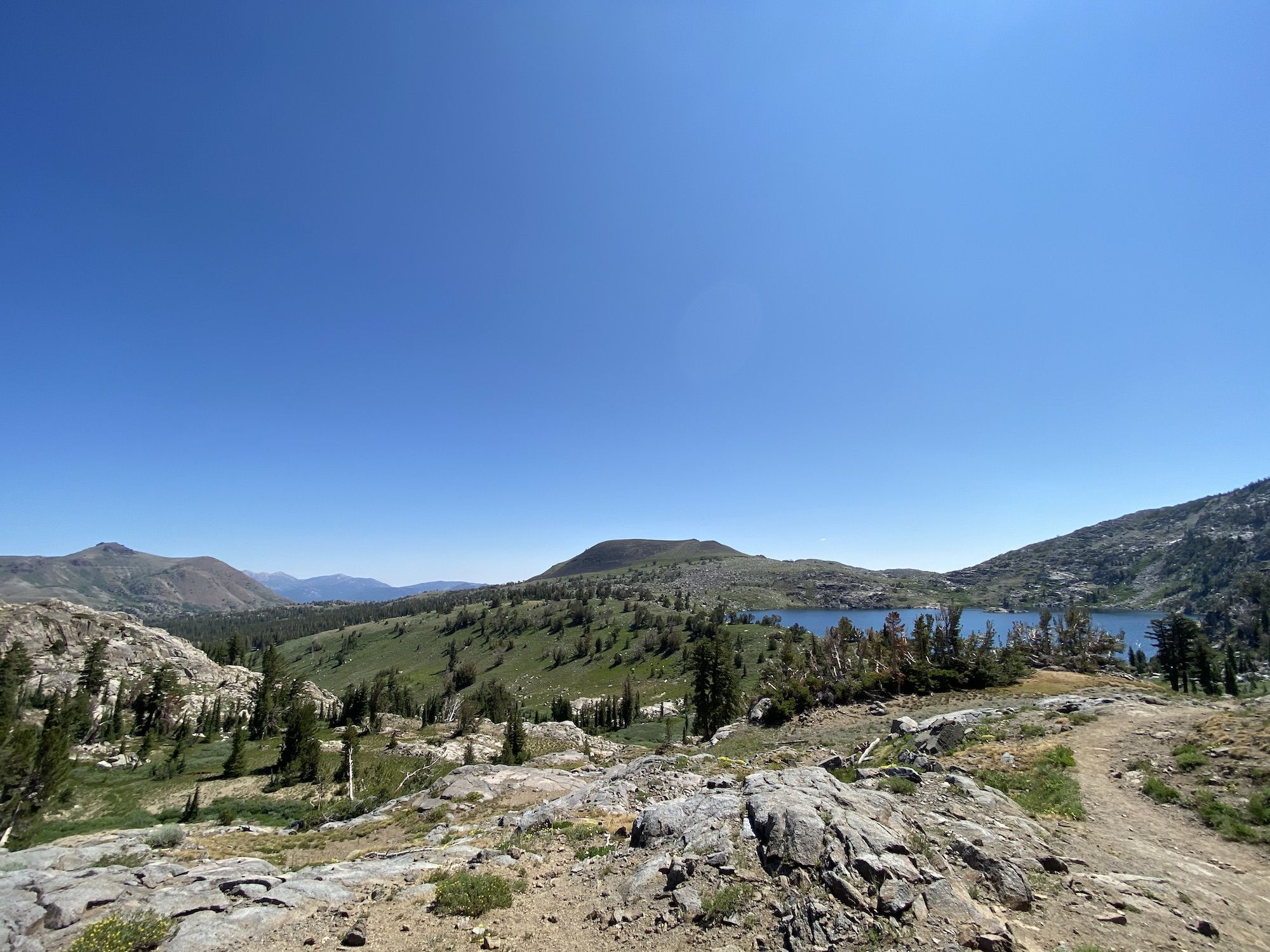 A mountain lake in the distance