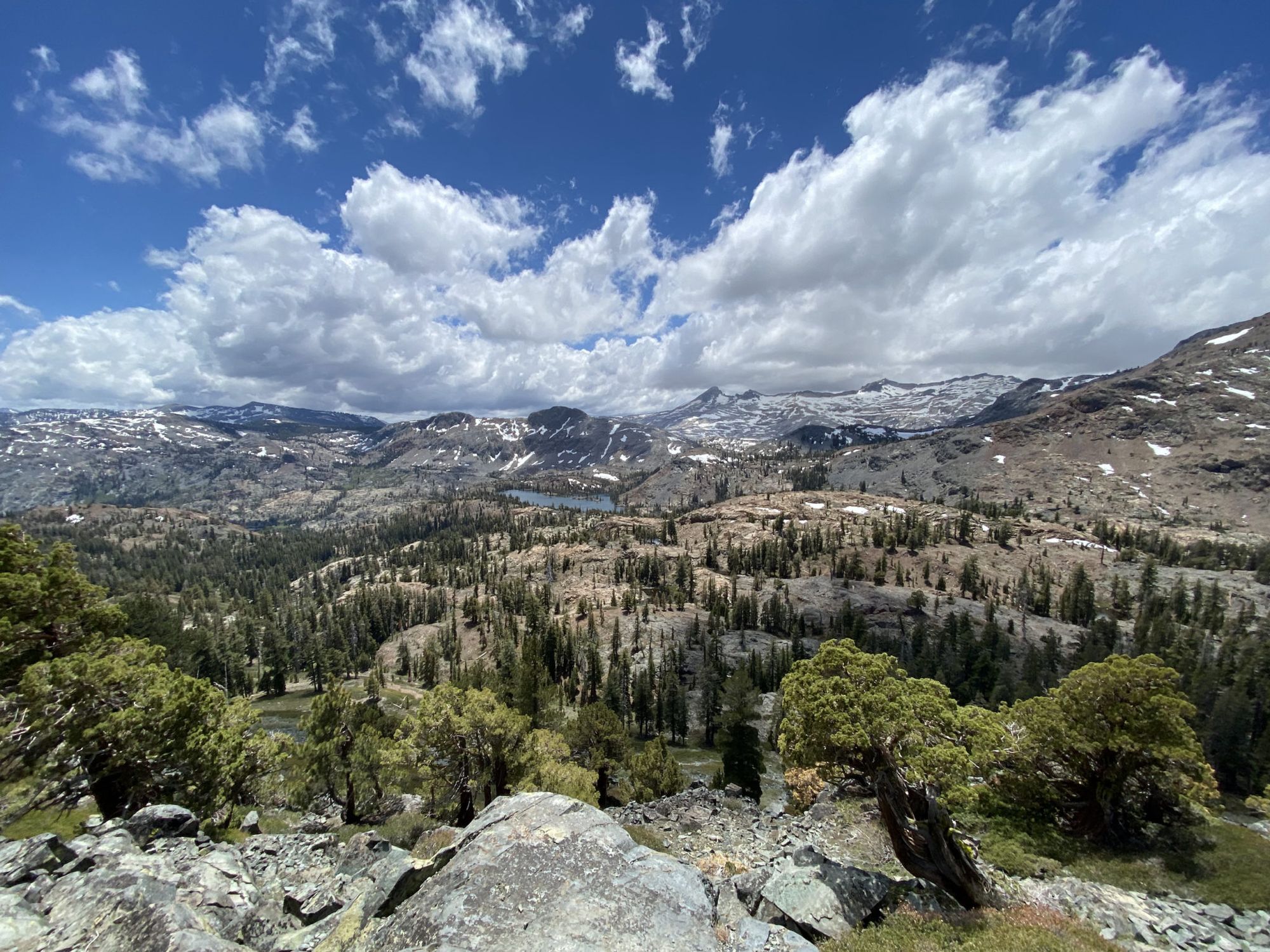 A rocky valley with a lake. 