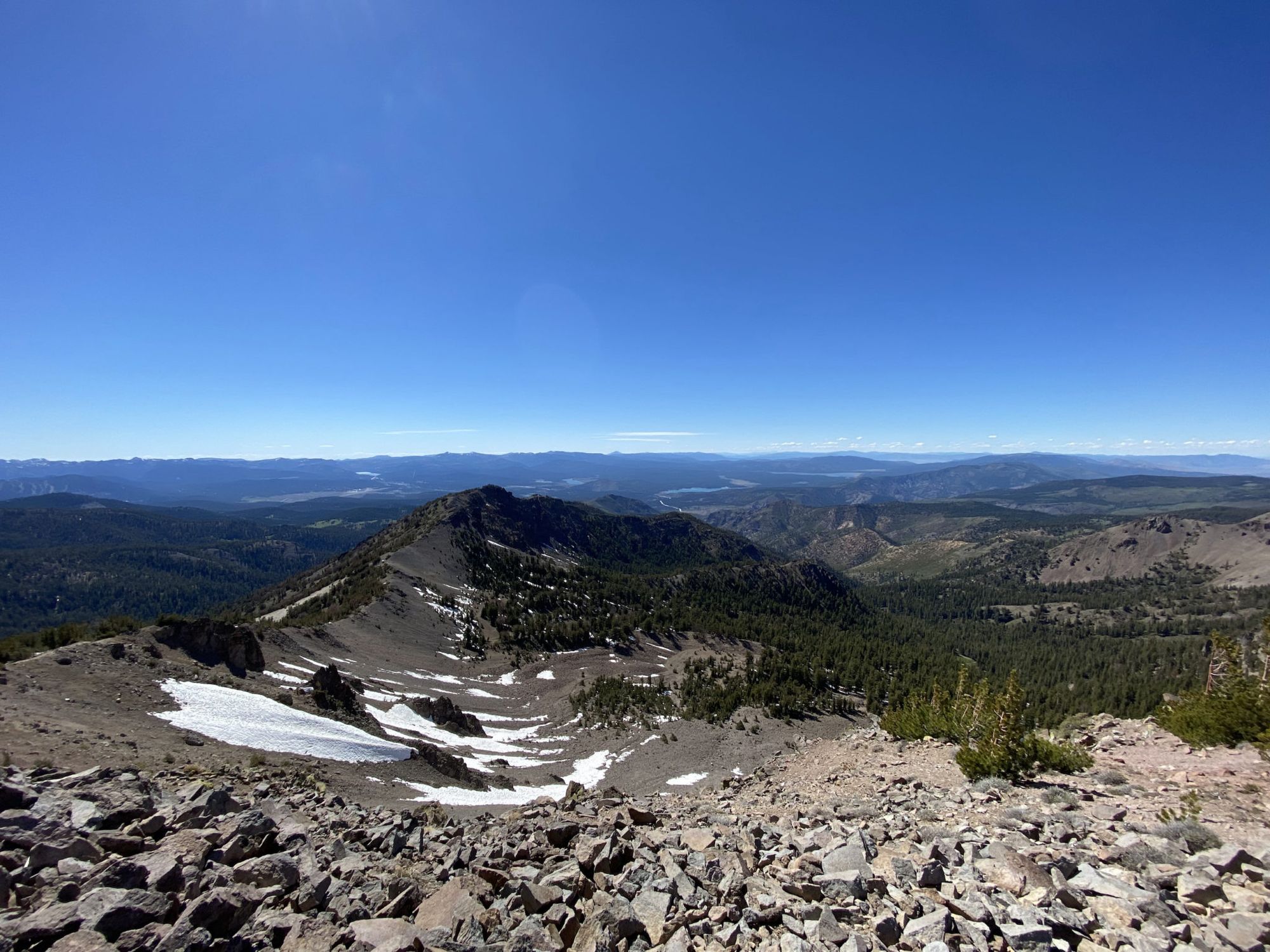 A rocky foreground with open moutain vistas