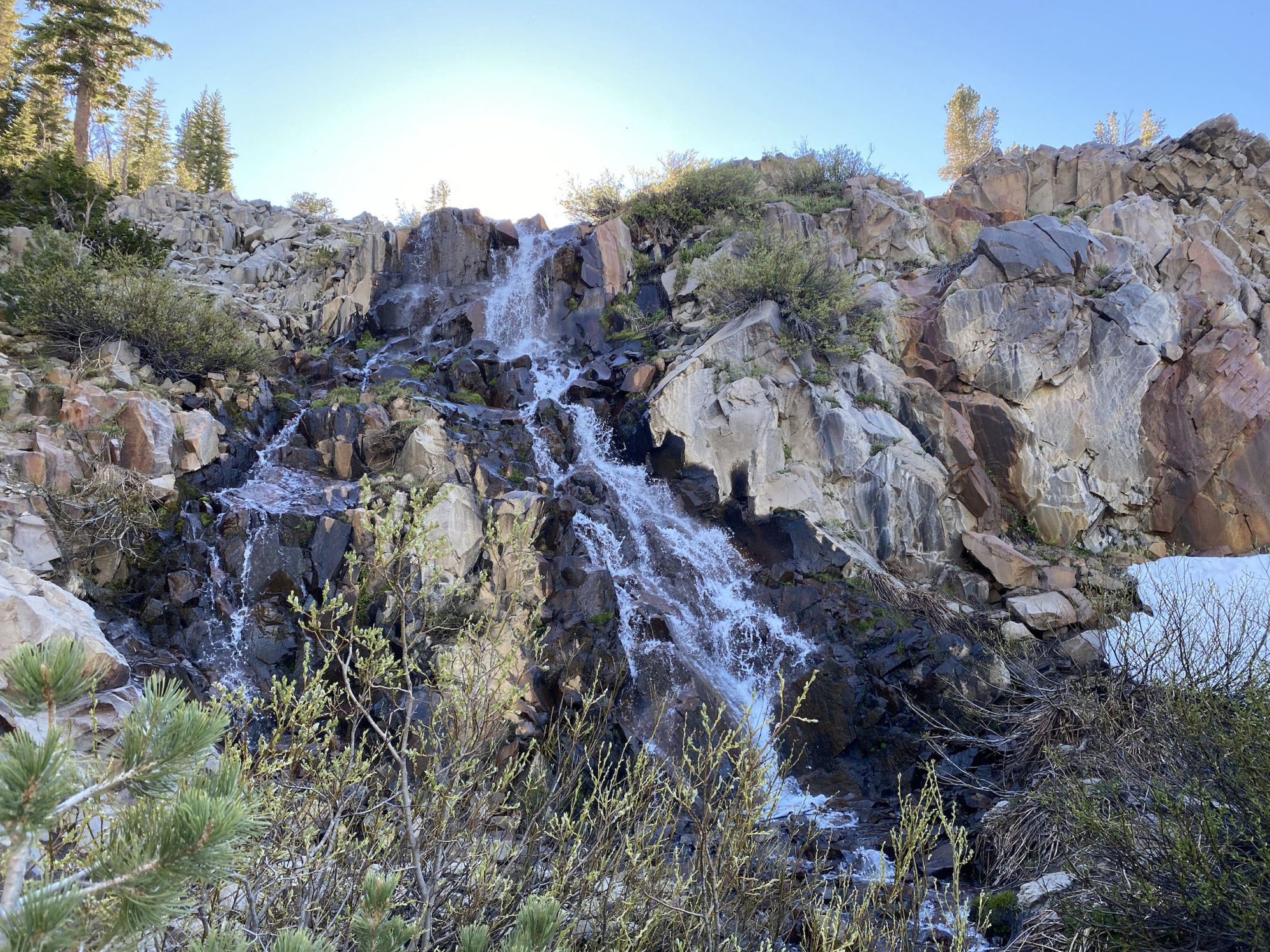 A small waterfalls running over rocks