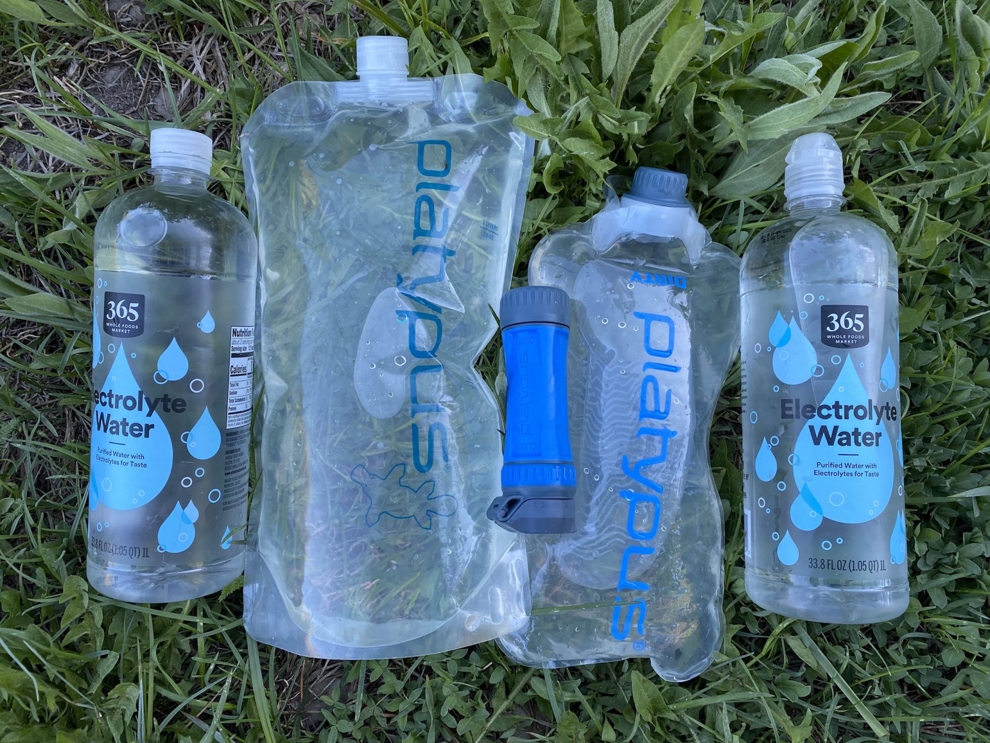 Two 1-liter bottles, one 2-liter soft bottle, and one 1-liter soft bottle. 