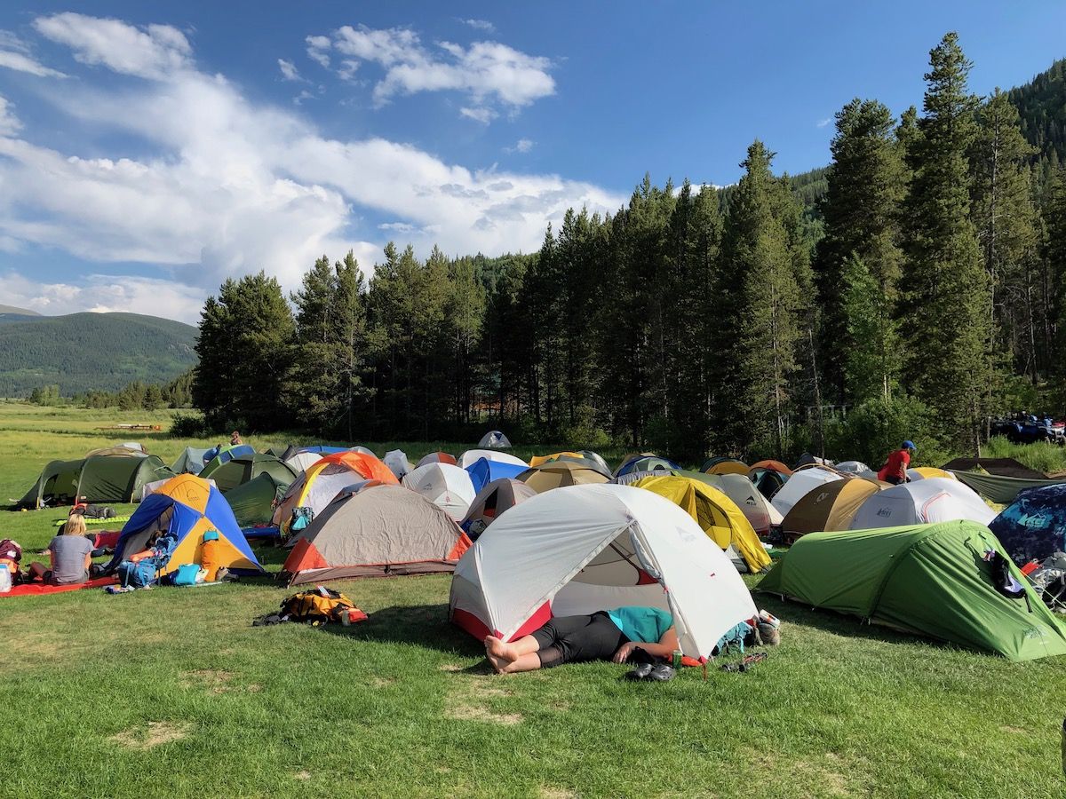 A tent city appeared on the lawn.