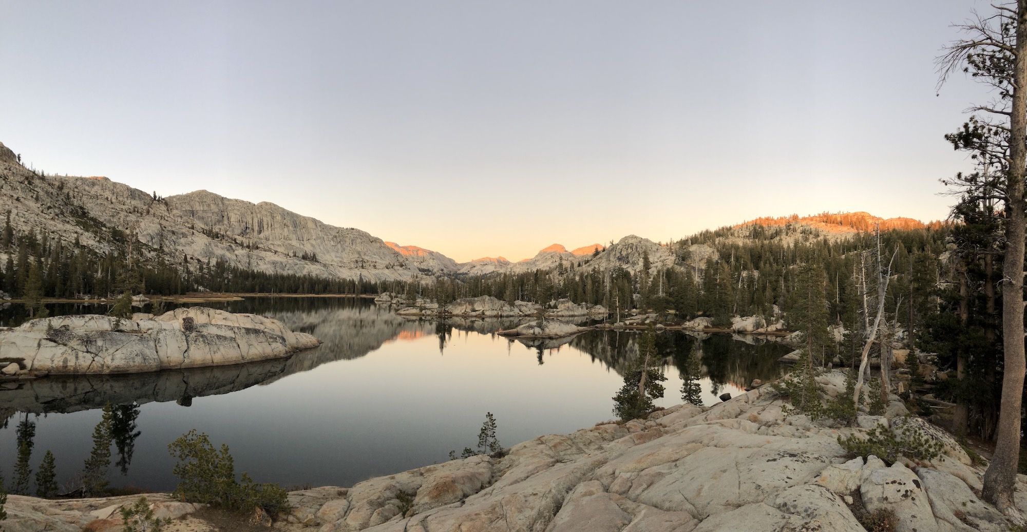 The sunset is coloring the tops of mountains red. Emigrant Wilderness offers some top notch backpacking opportunities.