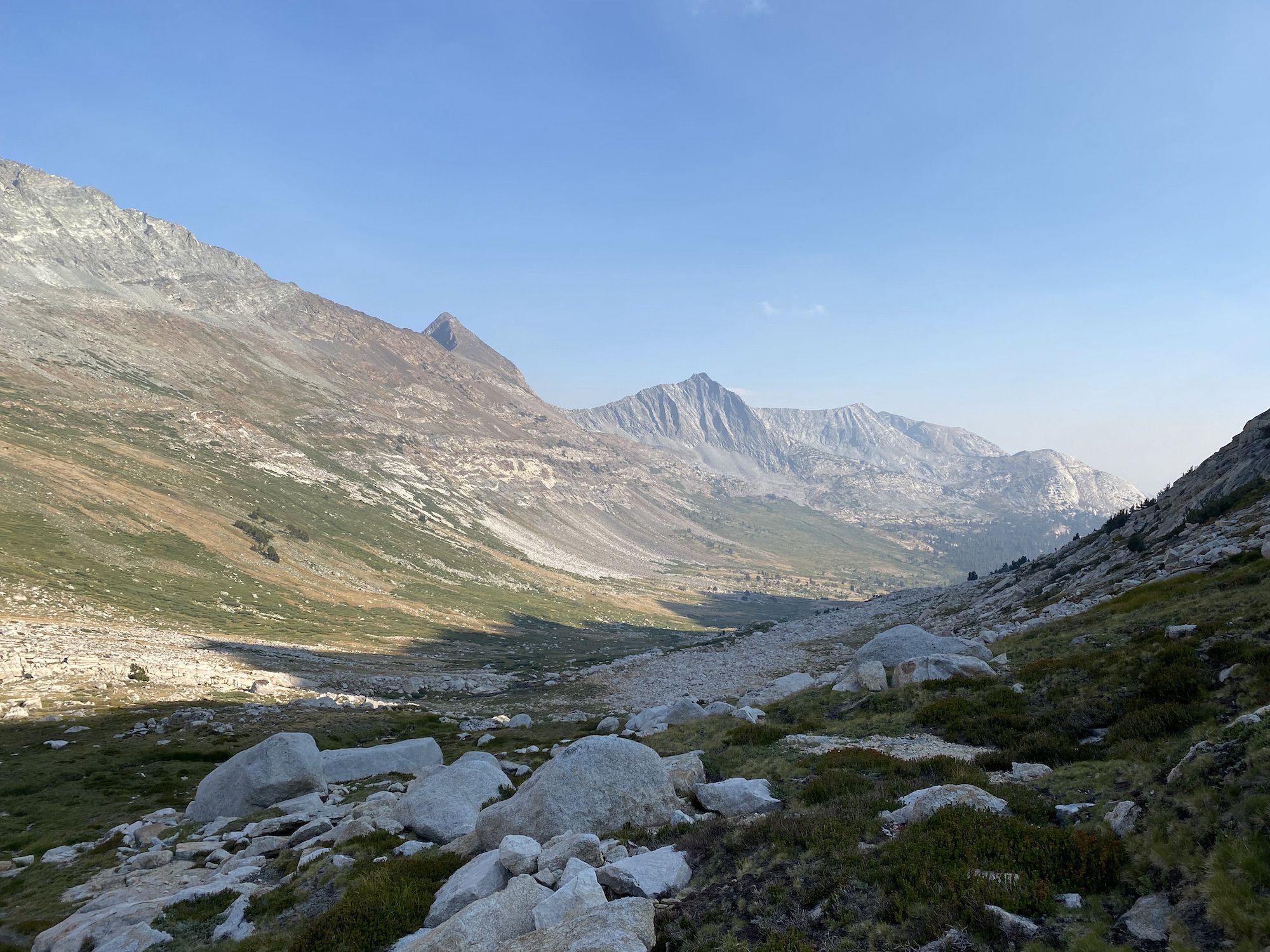 A rock and tundra covered mountain valley.