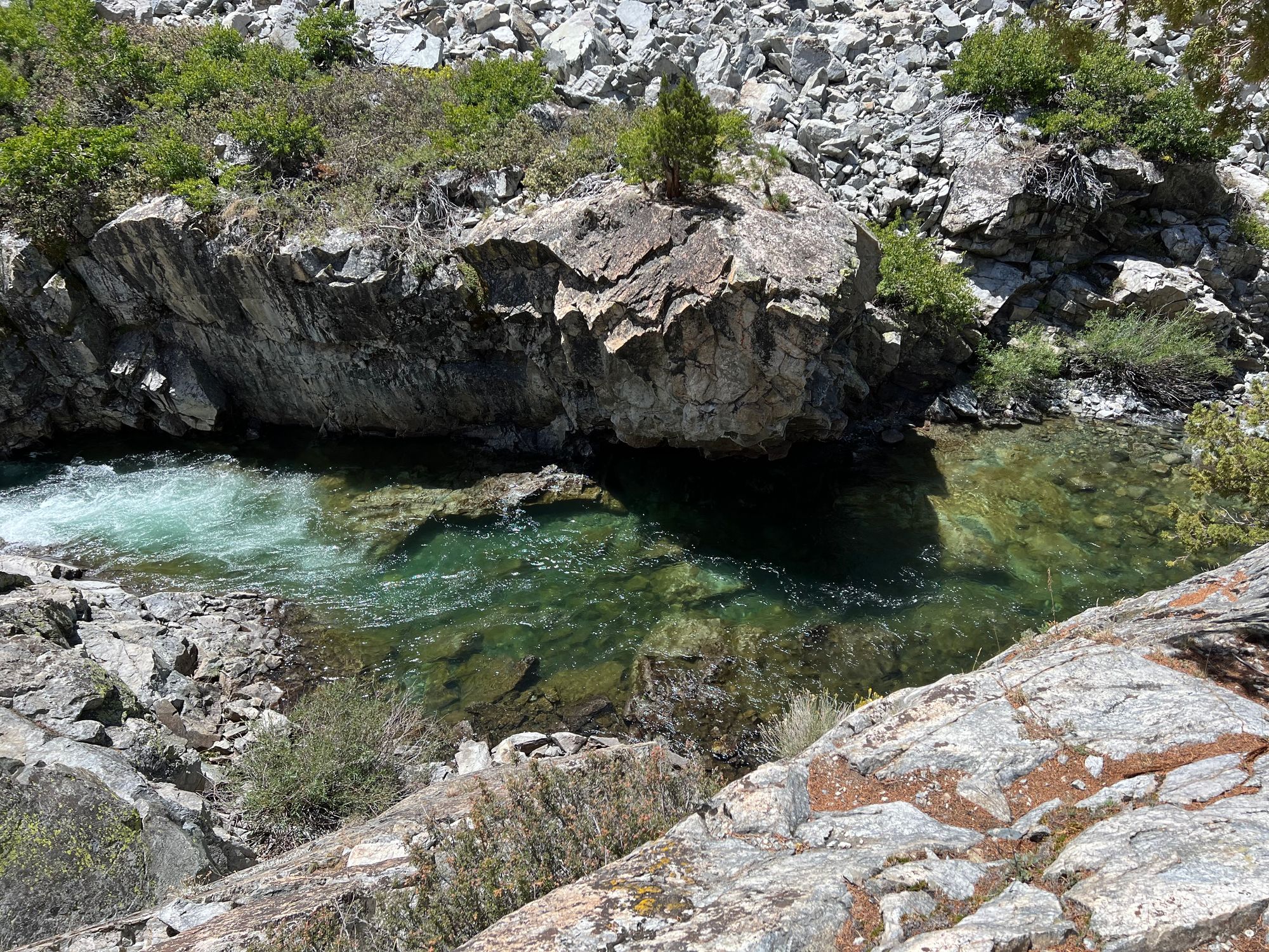 A river flowing between tall rock walls.